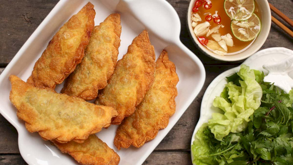 Tempting banh goi, offering a perfect blend of crispy pastry and rich, savory filling 
